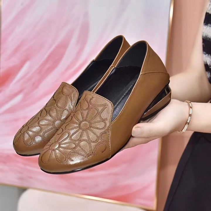 Women’s slip-on heeled ankle boots in leather with floral pattern Lune London