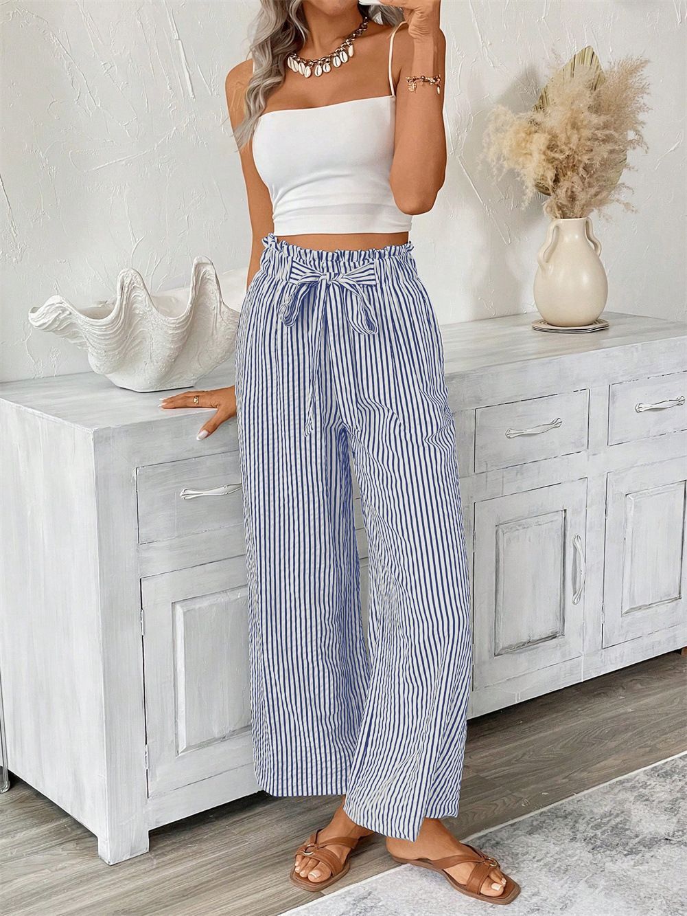 Wide striped leisure trousers for women with a tie belt Lune London