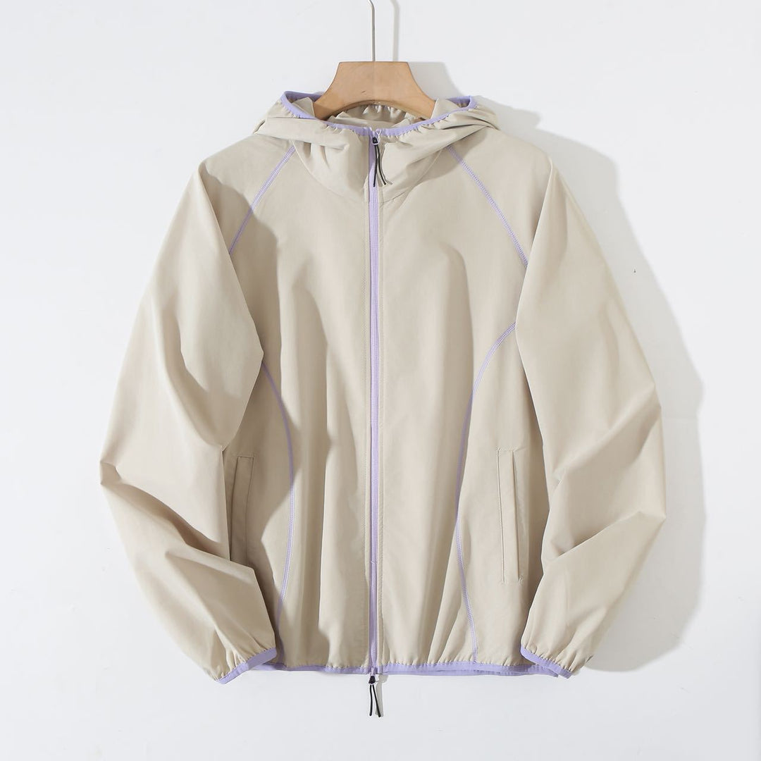 Veste coupe-vent légère pour femme avec un design de capuche innovant Chic & Stil