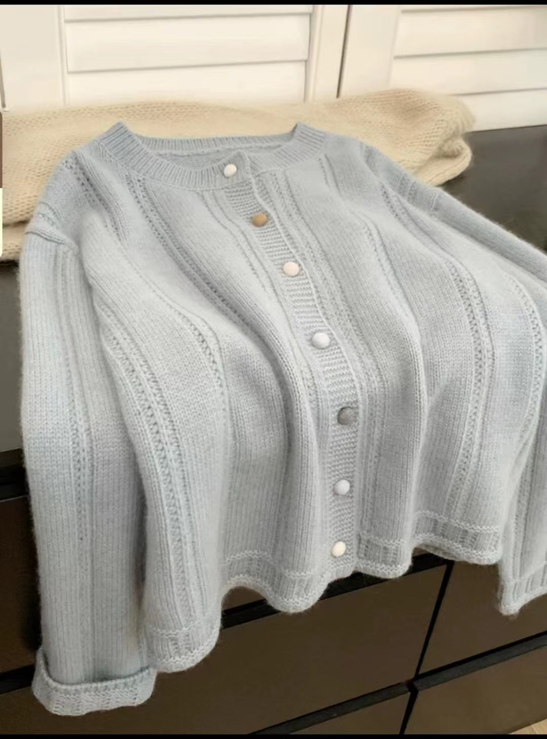 Chunky knit cardigan for women with an elegant button closure and wide sleeves Lune London