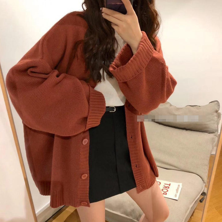 Casual knitted cardigan for women with voluminous sleeves and a chic button placket