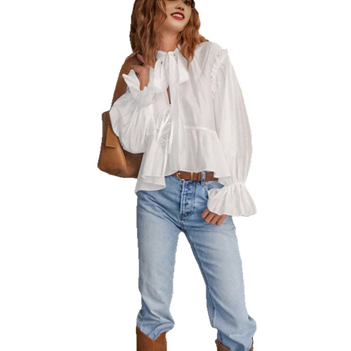 Fluid blouse for women with ruffles and a bow detail Chic und Stil