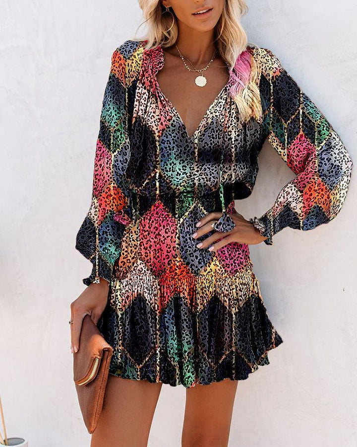 Ladies mini playful dress with colorful pattern and flounced details Lune London