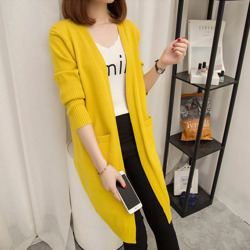 Ladies Long knitted cardigan with open front parts and deep pockets Lune London