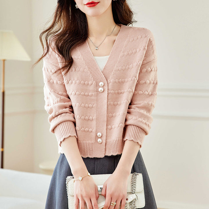 Ladies comfortable knit jacket with pearl adorned buttons and structured design Lune London