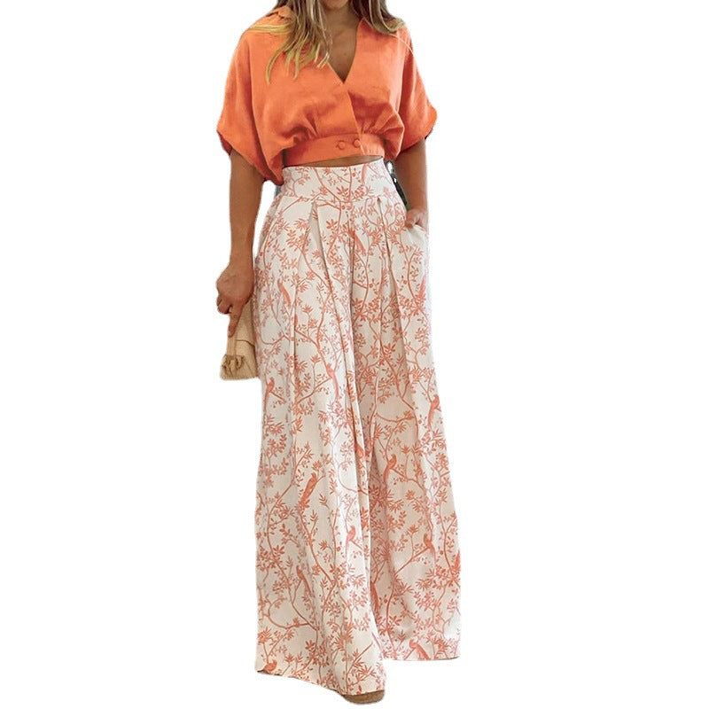 Top court élégant pour femmes avec des manches larges et un pantalon taille haute Chic & Stil