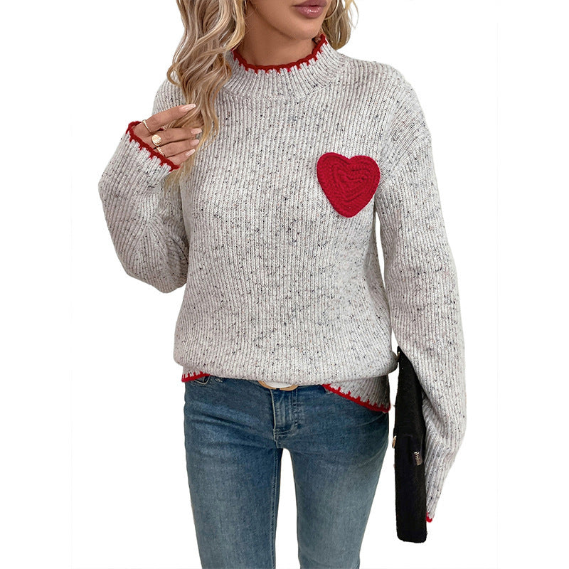 Knitted pullover for women with heart-shaped appliqué and decorative hem Lune London