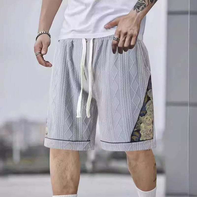 Men's athletic leisure pants with a creative floral design Lune London