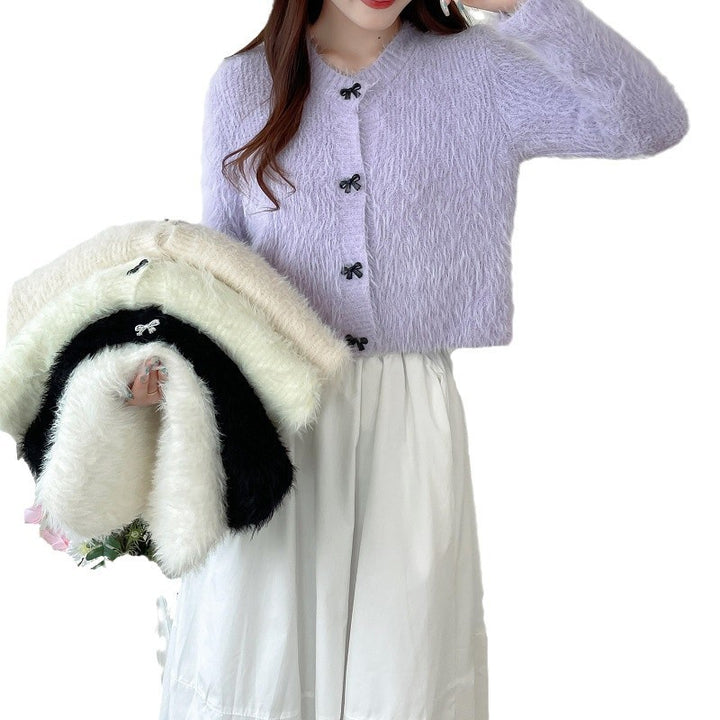 Women's cozy wool pullover with decorative bow buttons Lune London