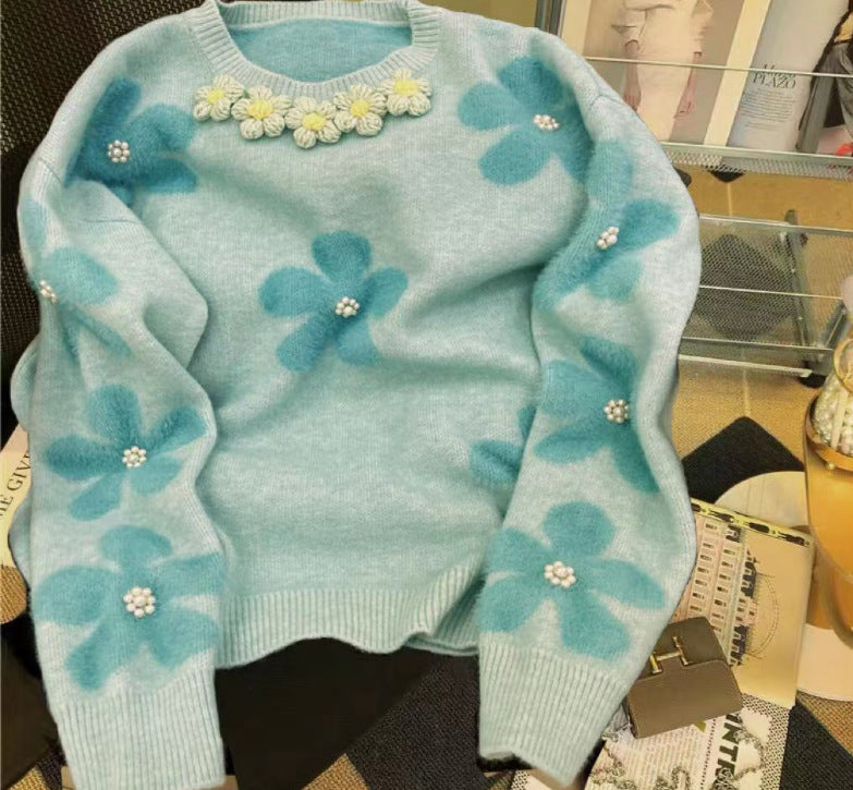 Pull en tricot pour femmes avec des appliqués floraux et des détails en perles Chic & Stil