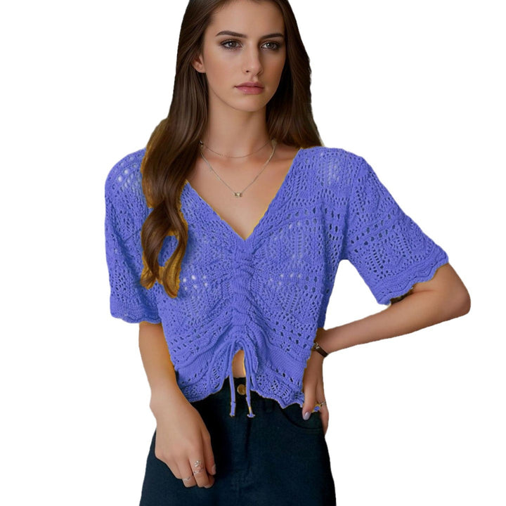 Women's knit top with decorative hole pattern and adjustable hem Lune London
