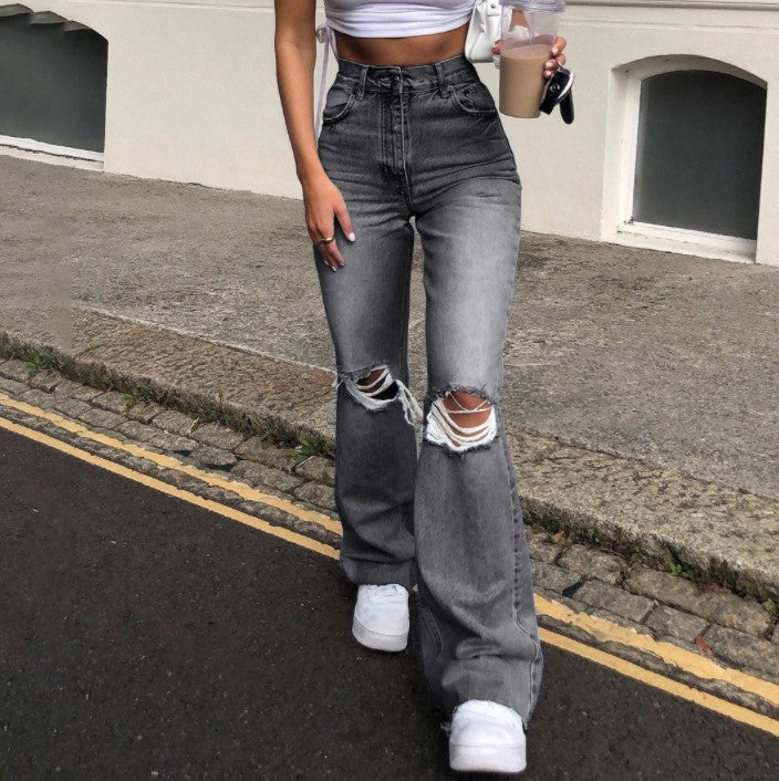 Ladies vintage flared jeans with stylish ripped details and high waistband Lune London