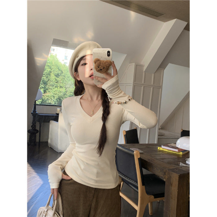 Women's long-sleeve shirt with V-neck and elegant rib structures Chic & Stil