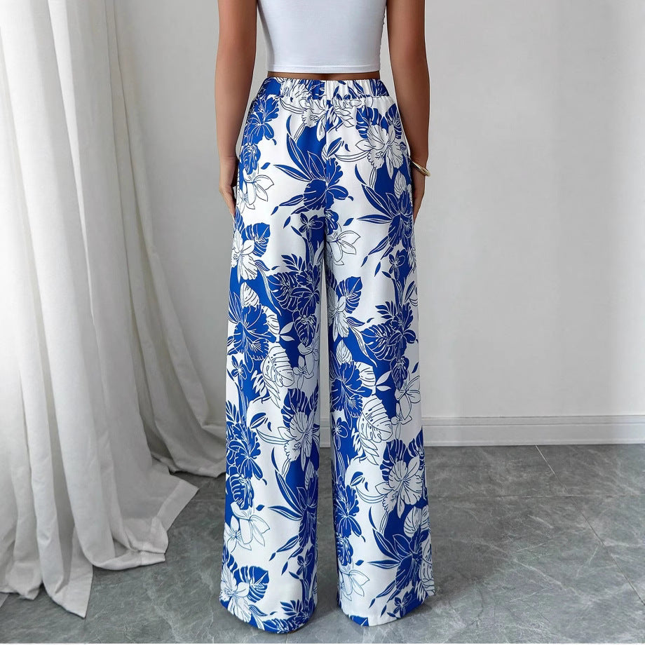 Pantalons palazzo taille haute pour femmes avec motif floral et poches latérales Chic & Stil