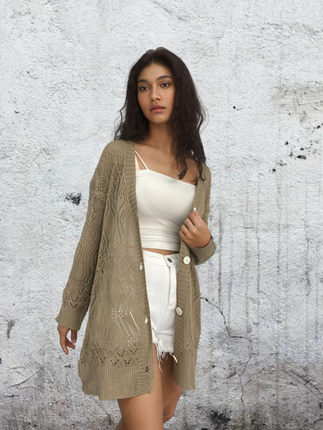 Ladies lightweight cardigan with delicate crochet pattern and chic button details