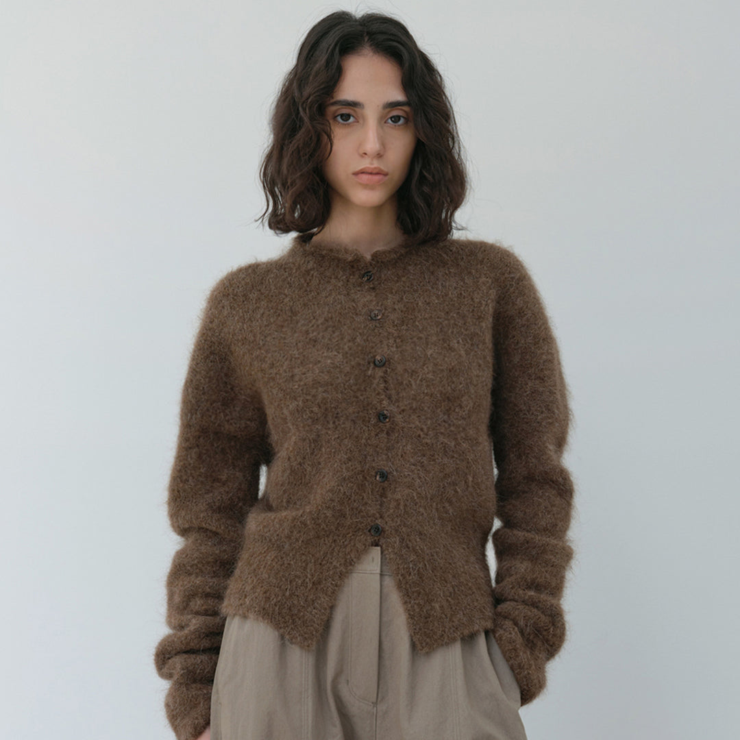 Veste en tricot élégante et chaude pour femmes avec patte de boutonnage Chic & Stil