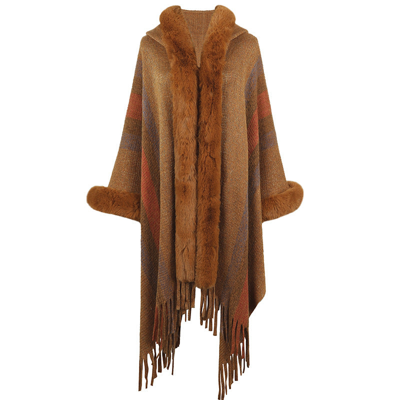 Women fashionable poncho with luxurious faux fur collar and fringes Lune London