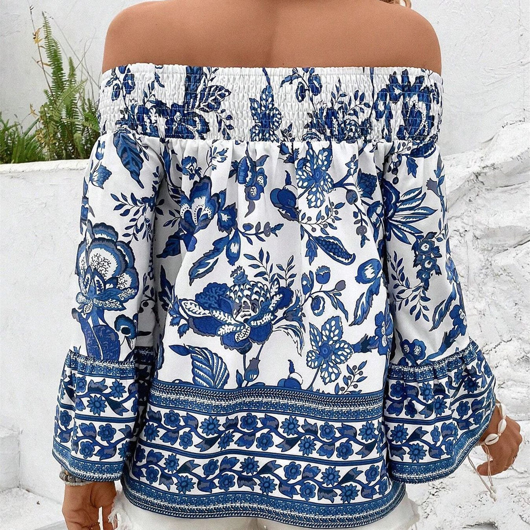Women's blouse with a plunging neckline, floral patterns, and elastic trim Lune London