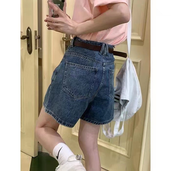 Women's denim shorts with high pockets and loose fit