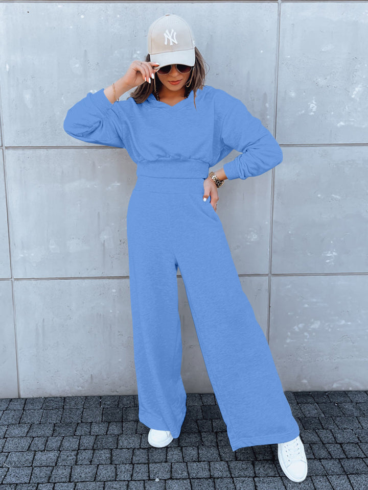 Combinaison décontractée pour femmes avec jambes larges et capuche pratique Chic & Stil