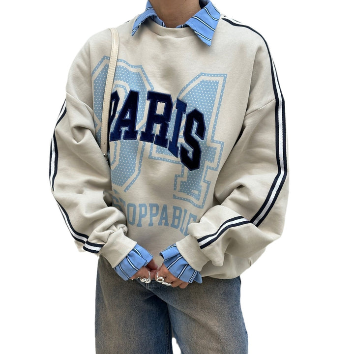 Oversized sweatshirt for women with Paris fashion print and striped accents Lune London