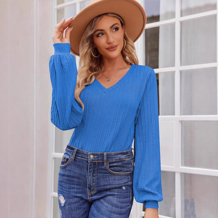 Women's knit sweater with a fine ribbed texture and a casual V-neck Lune London