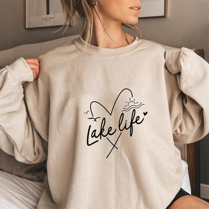 Sweatshirt pour femme avec des manches courtes et un motif en forme de cœur Chic & Stil