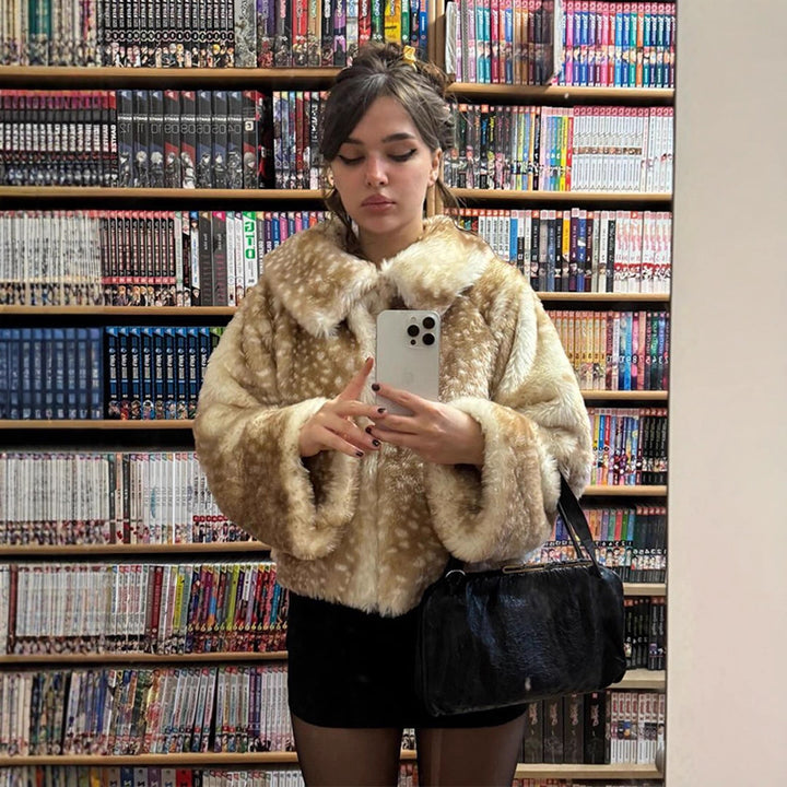 Ladies faux fur coat with wide collar and pretty ruffles Lune London