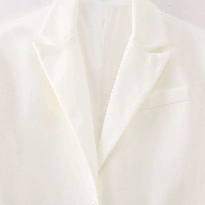 Elegant long coat for women with frayed details Lune London