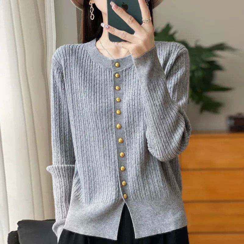 Lady's knit jacket with gold buttons Lune London