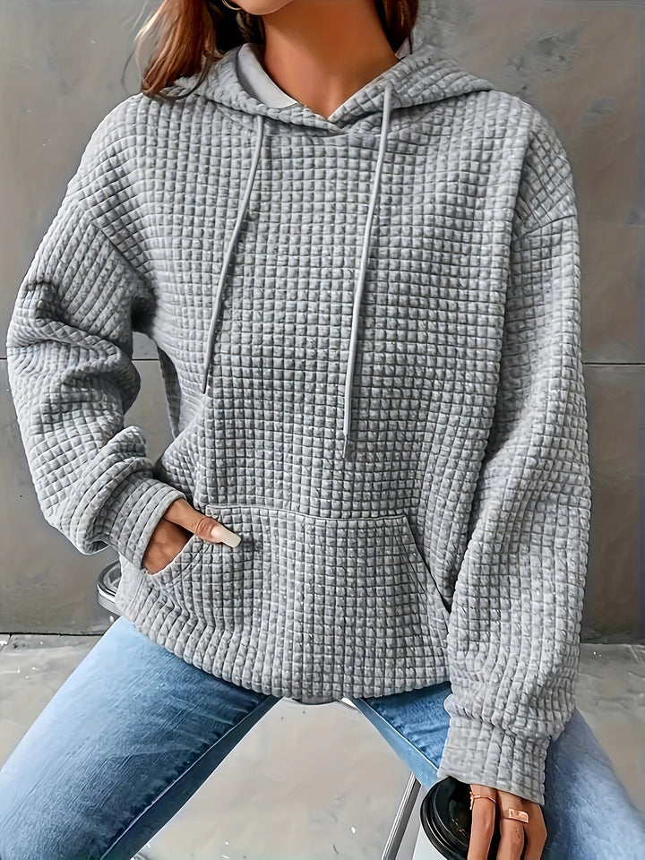 Sweat à capuche femme en motif waffle texturé avec poches latérales Chic & Stil