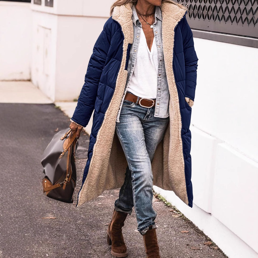 Winter coat for women in a casual oversized style with hood and side pockets Lune London
