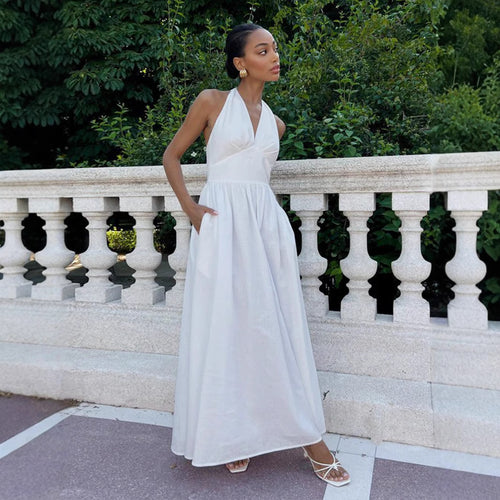 Elegant maxi dress for women with open back design and flowing skirt Lune London
