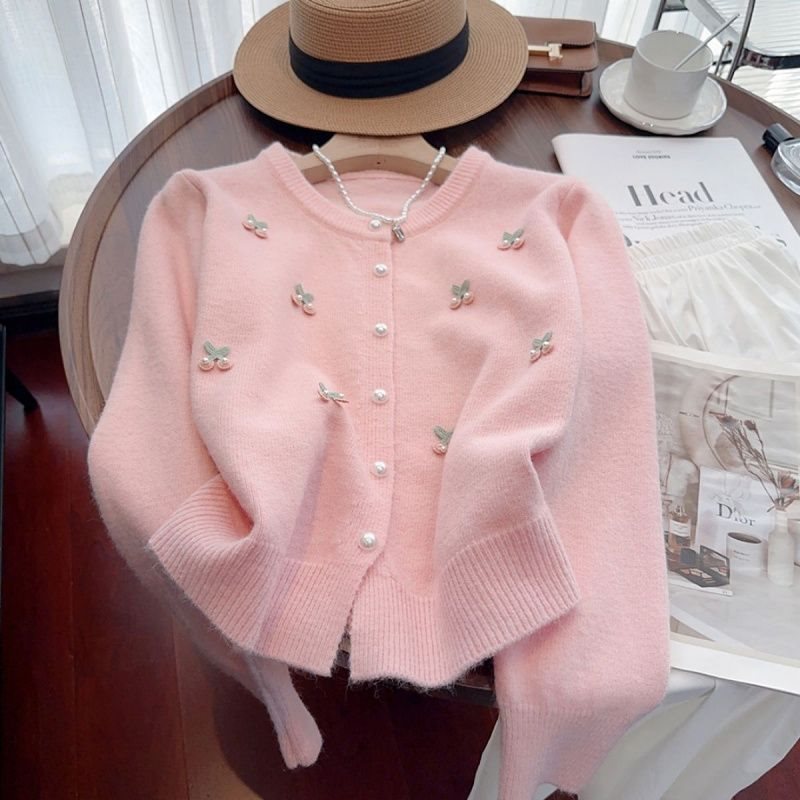 Knitted women’s jacket with floral design and pearl button details Lune London