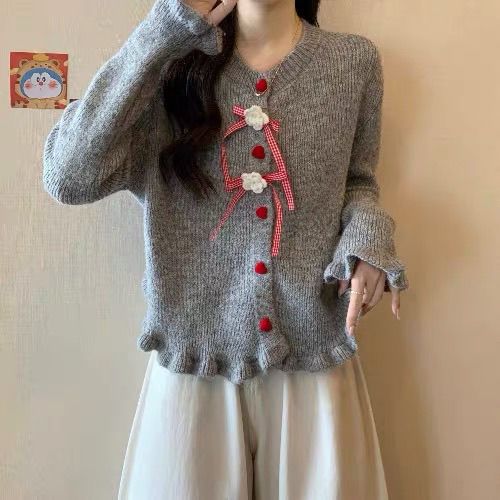 Cardigan pour femmes avec des motifs floraux décoratifs Chic & Stil