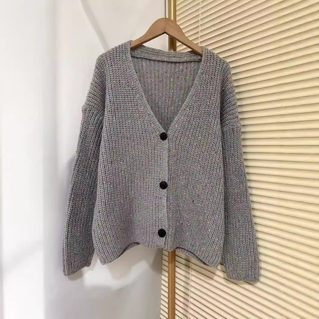 Women’s cozy chunky knit pullover with button detail and relaxed fit Lune London