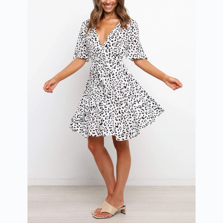 Women's wrap dress with generous ruffle sleeves and beautiful animal print Lune London