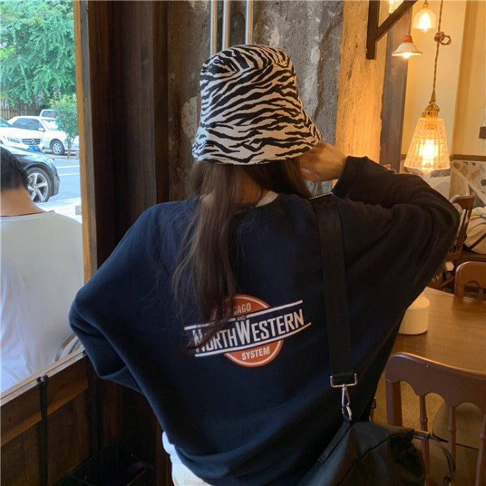 Women's casual oversized sweater with stylish logo and pleasantly soft interior lining Lune London
