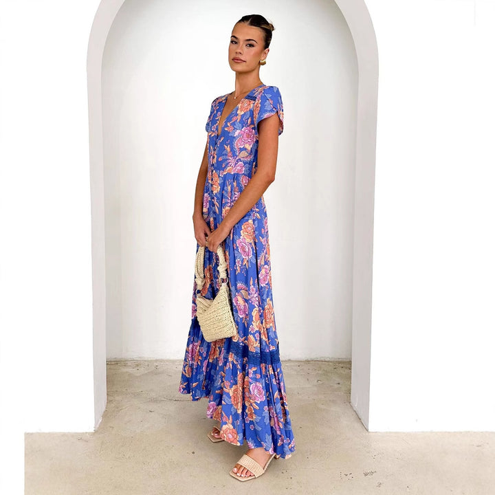 Maxi dress for women with floral pattern and deep V-neck Chic & Stil