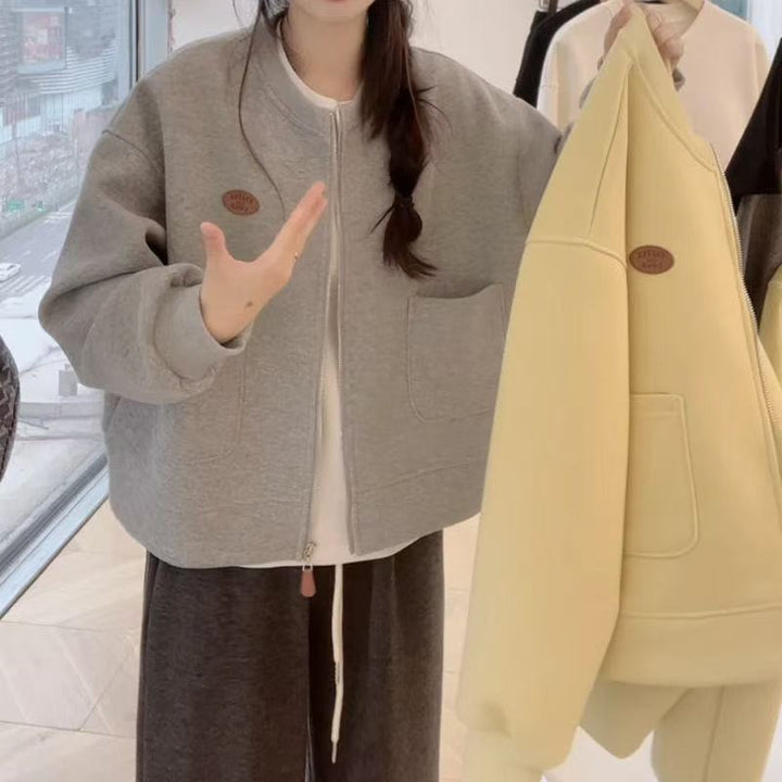 Women's oversized sweat jacket with practical pockets and fashionable design Chic & Stil