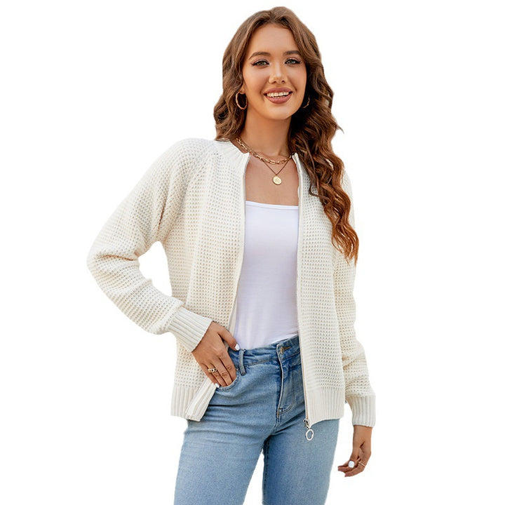 Women's knitted jacket with a modern textured pattern and practical zippered pockets Lune London