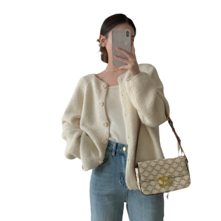Cardigan en tricot confortable pour femme avec patte de boutonnage et coupe large Chic & Stil