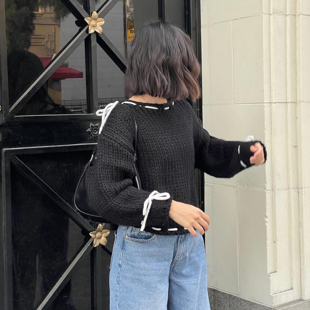 Chunky knit sweater for women with a casual off-the-shoulder design Lune London