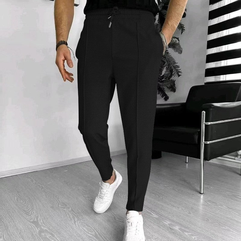 Luxury men's pants with elastic drawstring and textured design Lune London