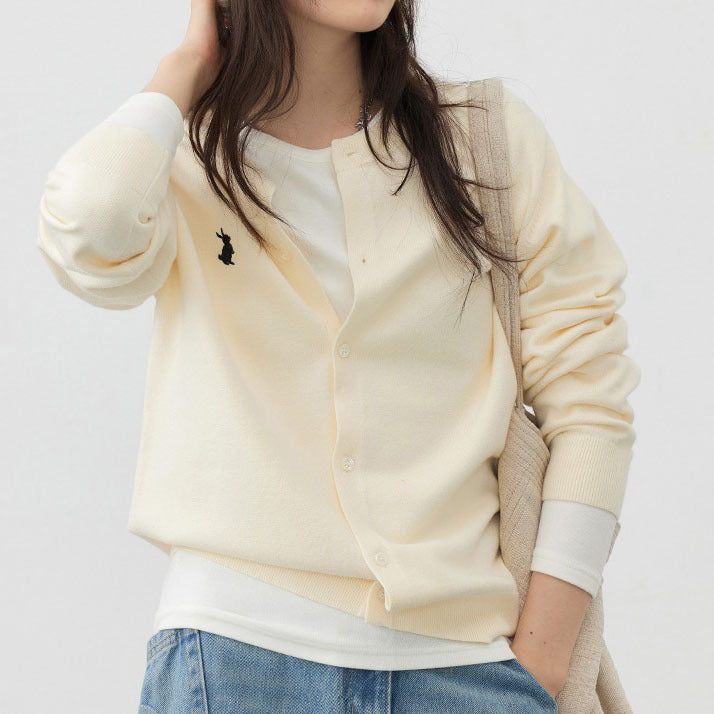 Ladies soft knit jacket with fine button details and a chic and stylish design