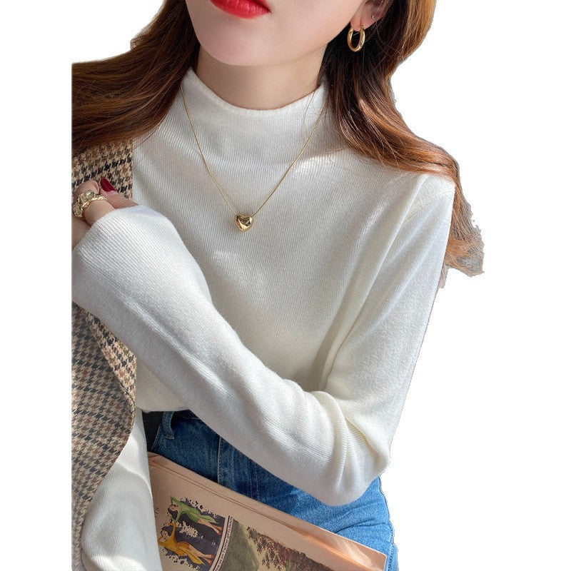 Pull-over tricoté pour femmes avec col montant et matériau doux Chic & Stil