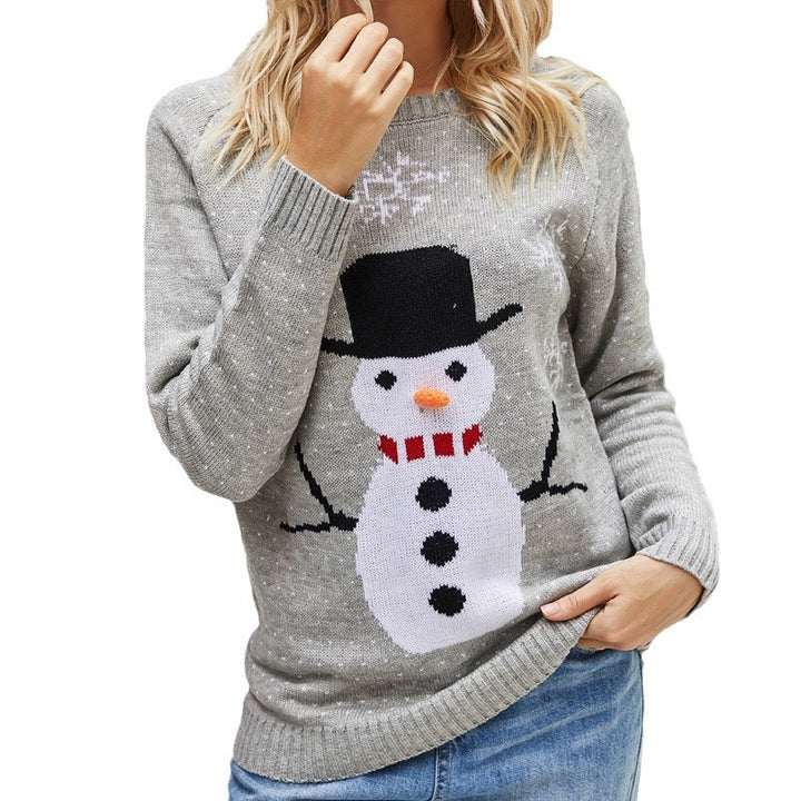 Christmas knitted sweater for women with living snowman motif and festive design Lune London