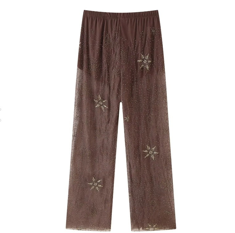 Elegant transparent Palazzohos pants for women with sparkling applications Lune London
