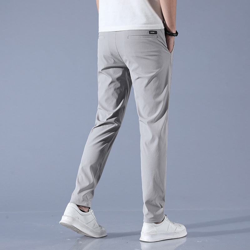 Sports jogger pants for men with elastic waist and practical zip pockets Lune London