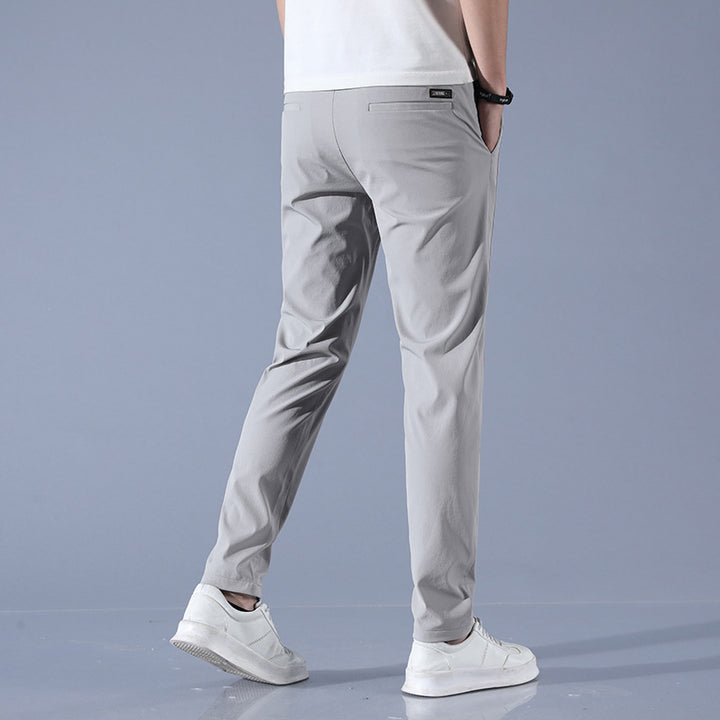 Sports jogger pants for men with elastic waist and practical zip pockets Lune London